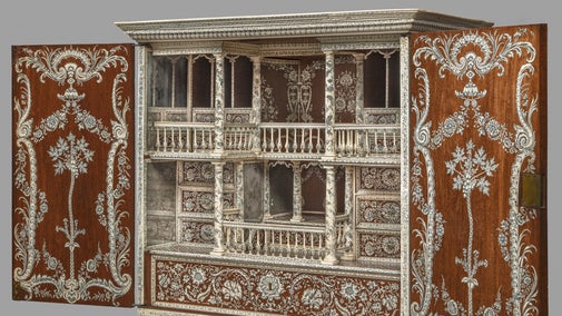 Eighteenth-century cabinet on a stand, made of wood and inlaid with ivory inlay